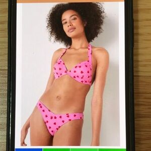 Pink Victoria’s Secret small push up triangle Bikini set with Red Heart Pattern.